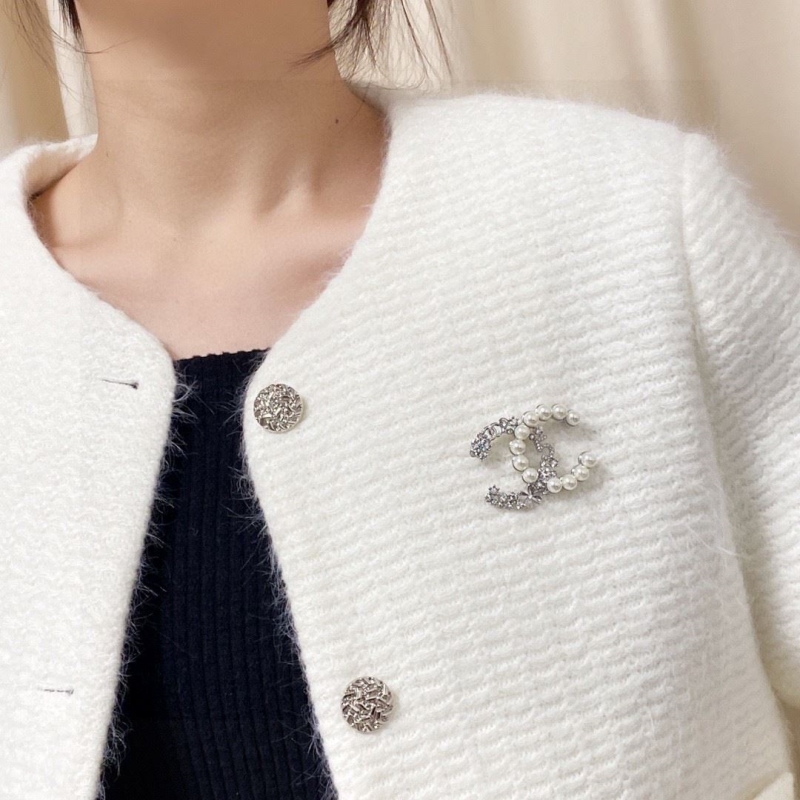 Ch**el brooches
